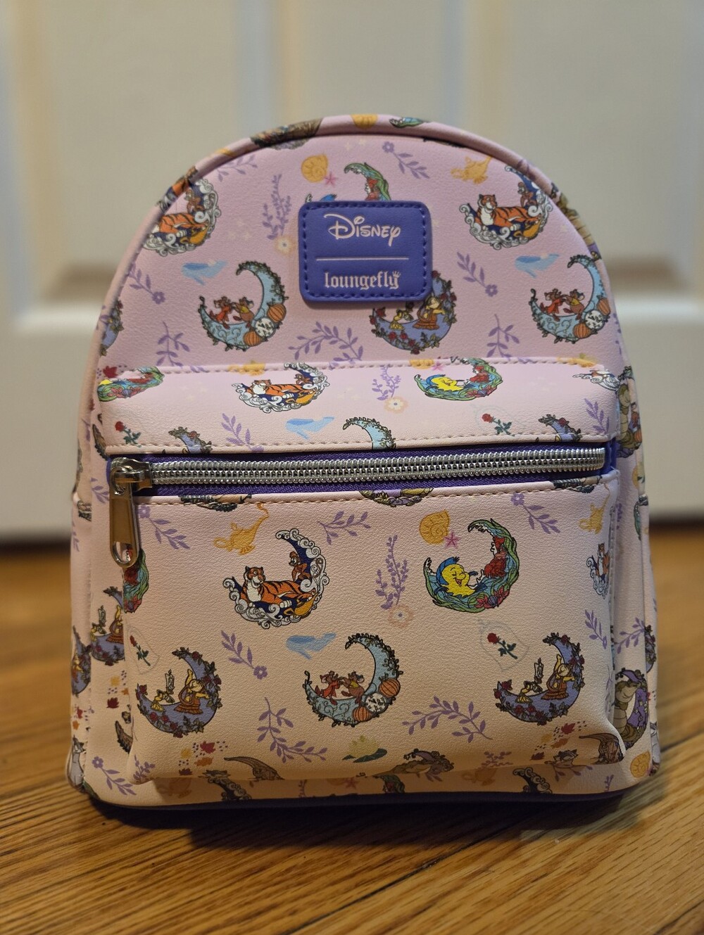 Disney Loungefly Pastel Pink Mini Backpack with Multicolor Character Print